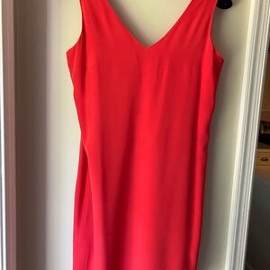 Warm tomato red dress in a generous size 6.